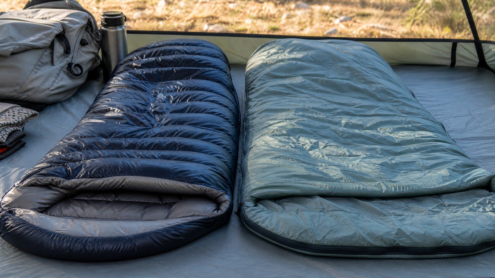 Down and synthetic sleeping bags side by side