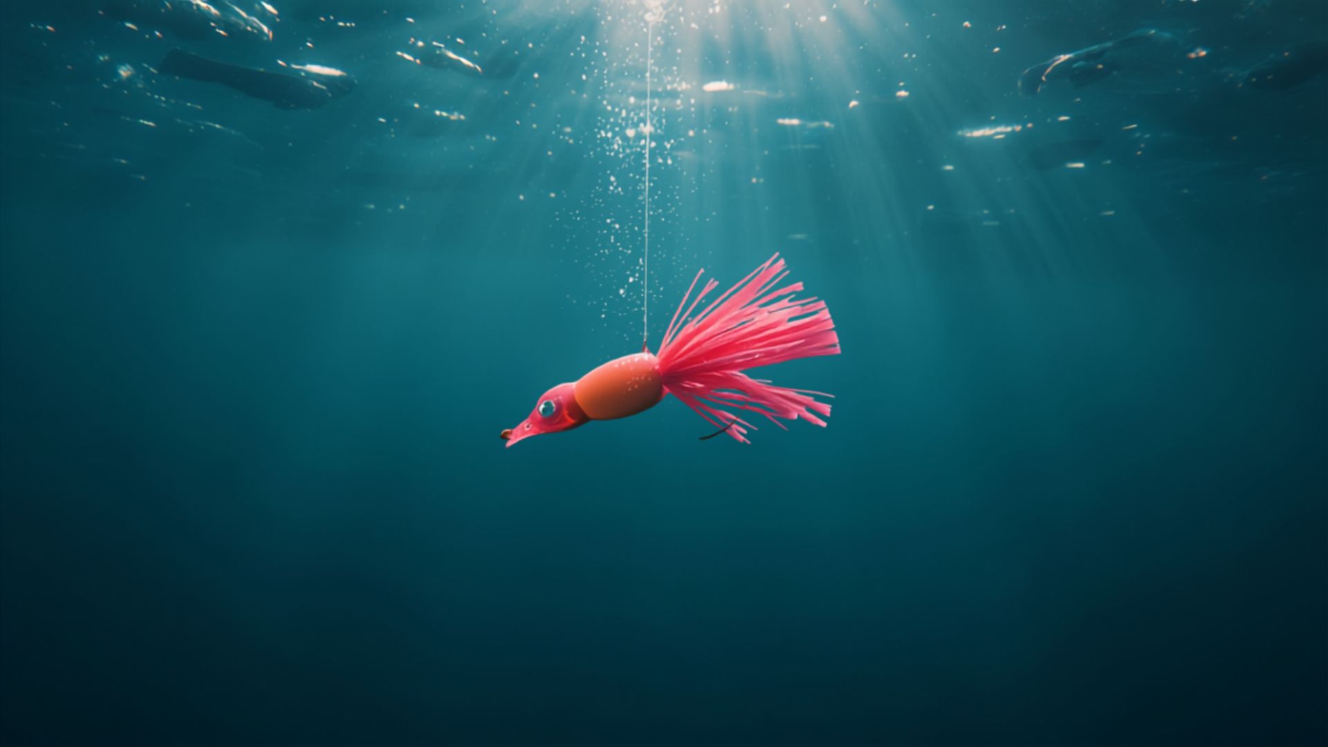 A prawn-shaped squid jig held wet over the water at dusk.