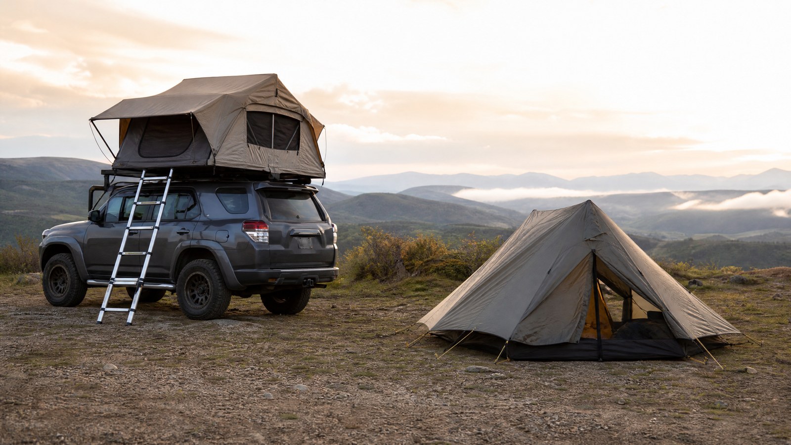 Rooftop tent and ground tent set up side by side