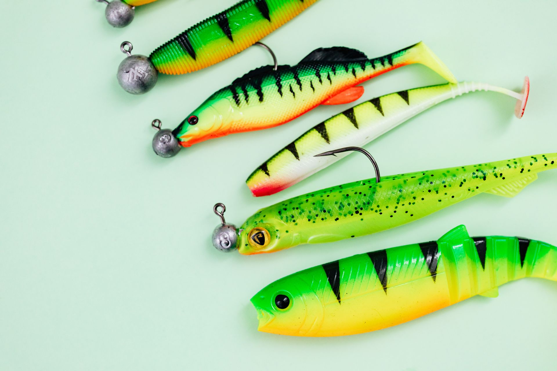 Soft plastic lures rigged on weighted jig heads