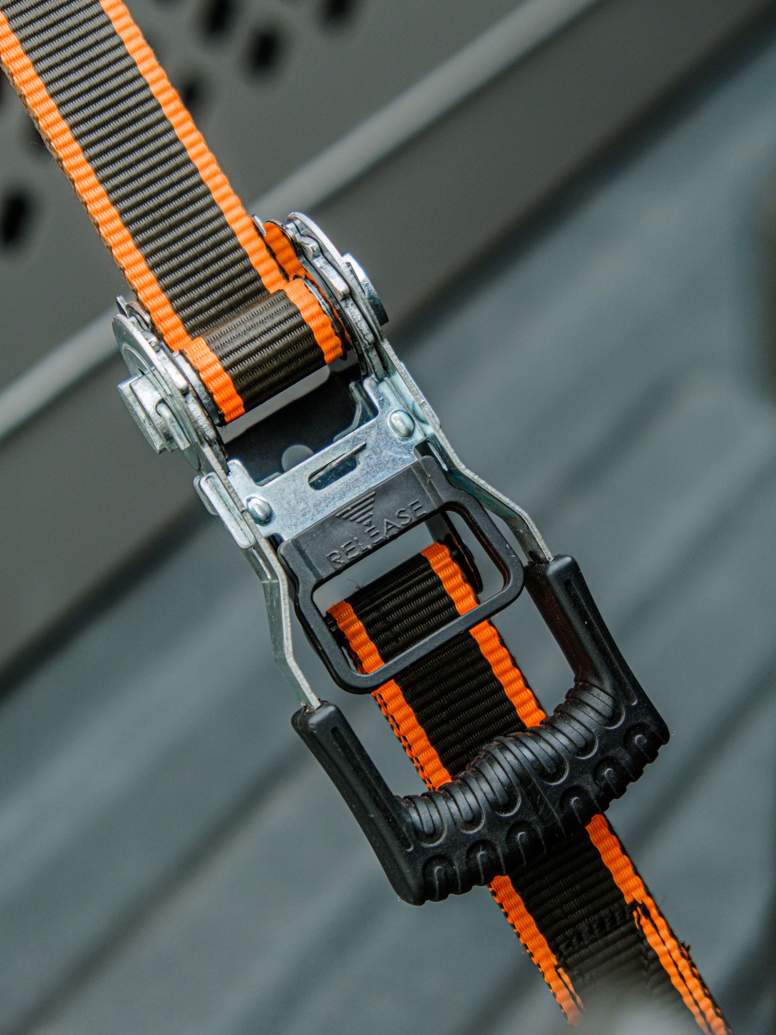 Ratchet tie-down strap with buckle and webbing